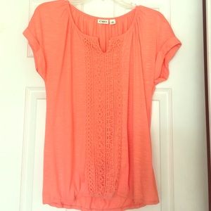 Peachy colored blouse