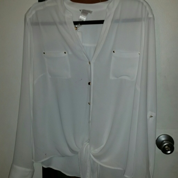 Never wore it... has 2 small pink stains wash out