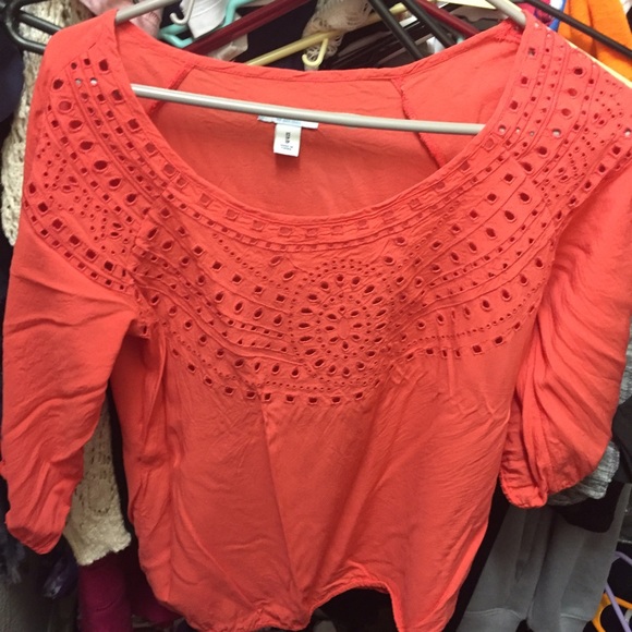 red/ orange blouse