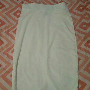White skirt with slit.