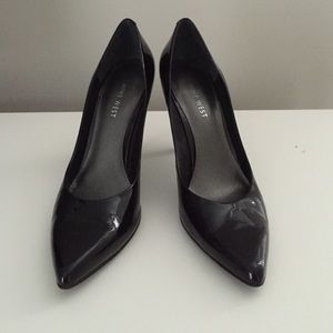 Nine West, black patten leather heels.