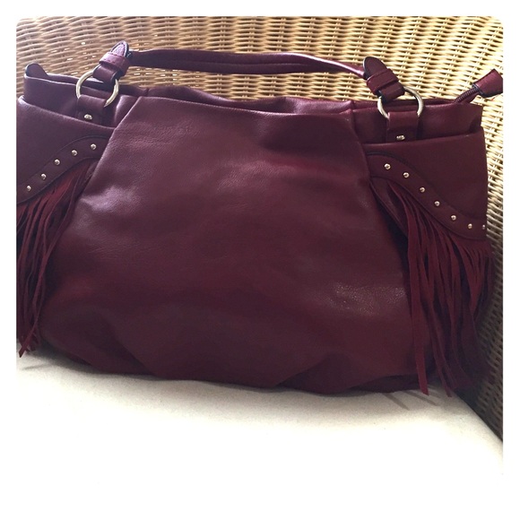 Tomato red bag detailed with studs and fringe