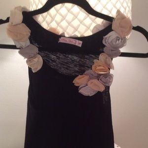 Flower embellished black tank top