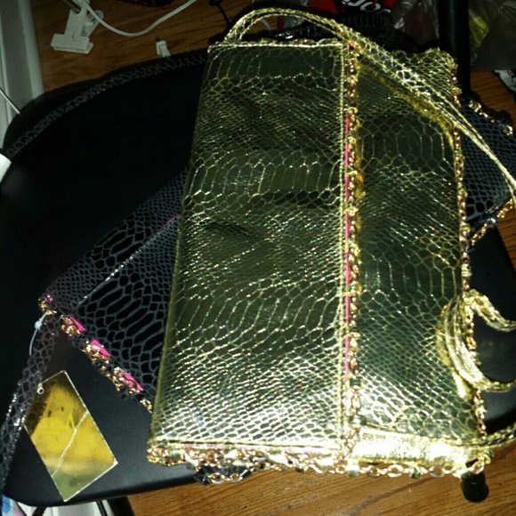 2 nicki minaj purses black or gold !