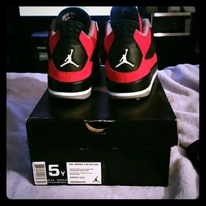 Size 5y = 6.5 in womens Jordan 4 retros