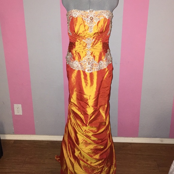 Orange taffeta formal gown with lace overlay