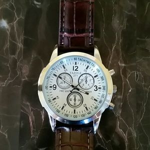 Watch. Was a gift but I don't want it