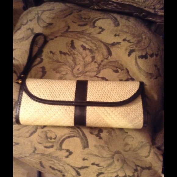 Putu straw wristlet clutch by J. MacLear.
