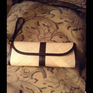 Putu straw wristlet clutch by J. MacLear.