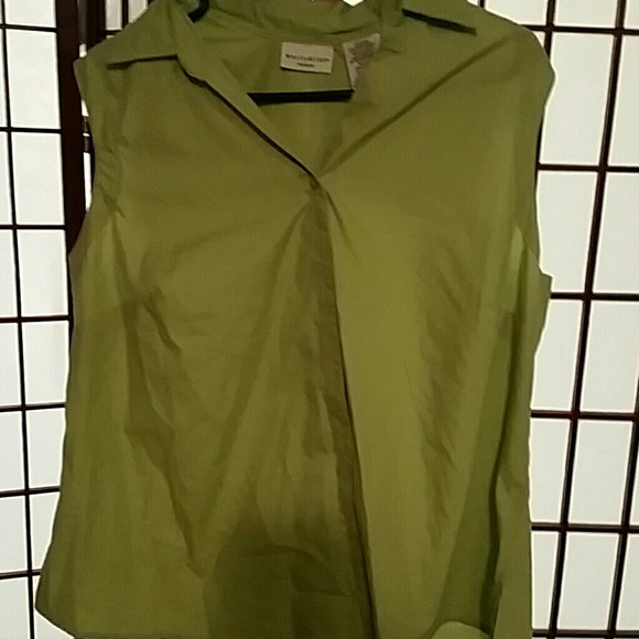 Sleeveless green button up shirt.