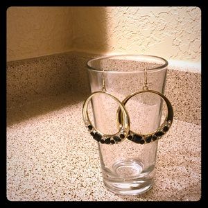 Hanging hoop earrings.
