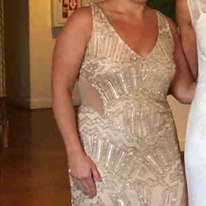 Adrianna Papell heavily beaded deep V gown.