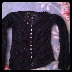 Blue knit sweater.