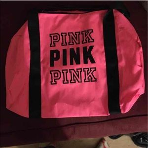 Pink duffle bag