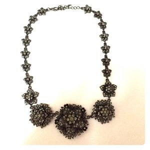 Black, floral statement necklace.
