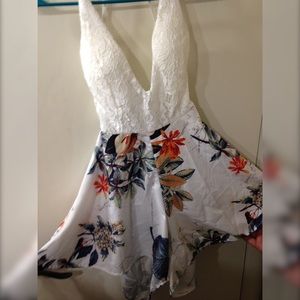‼️Sexy Spaghetti Strap Backless Floral Fall Romper