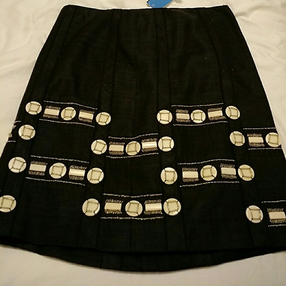 Dark grey skirt with button looking embellishments