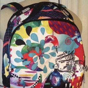 Very cute multi cor black pack by Le Sportsac