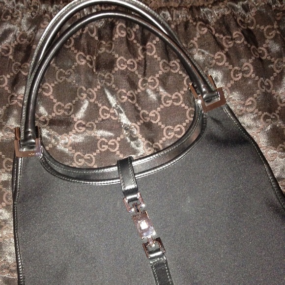Authentic, classic gucci handbag. Silver hardware.