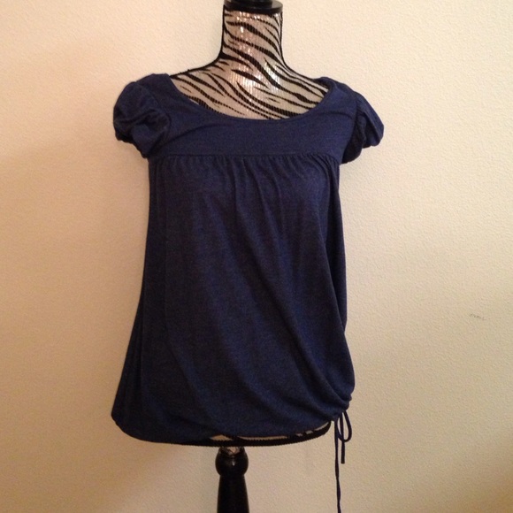 Blue top, ties at the bottom