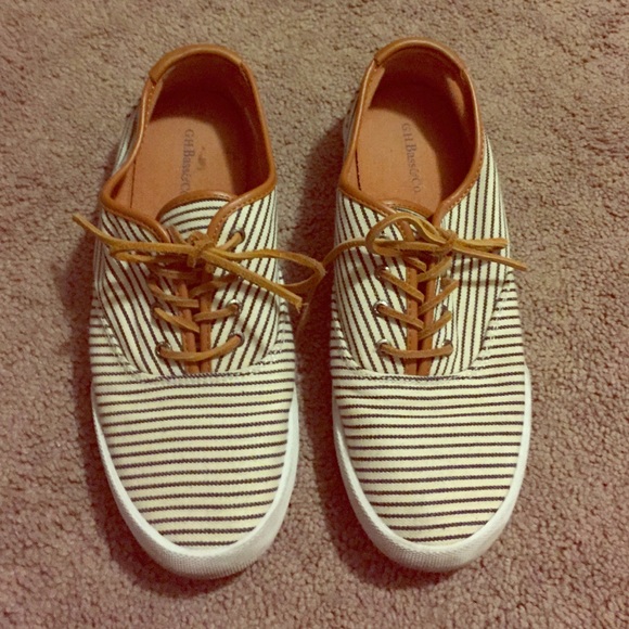 Navy blue and tan striped sneakers