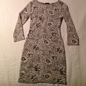 3/4 sleeved black and white lace patterned dress.