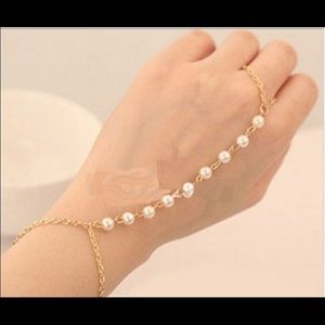 Beautiful pearl bracelet slave ring....
