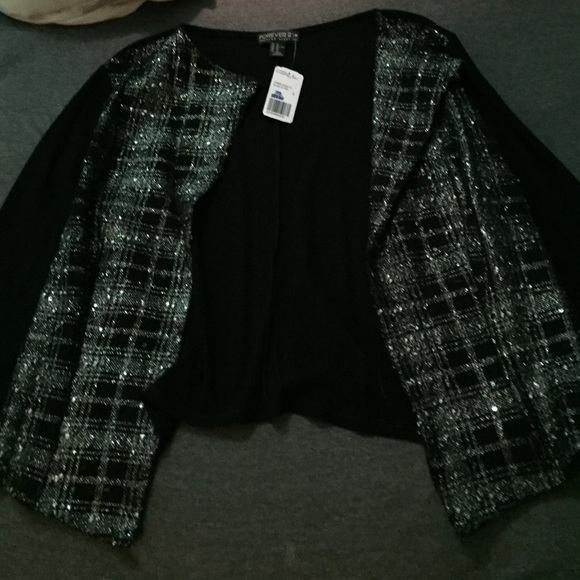 black cardigan with plaid