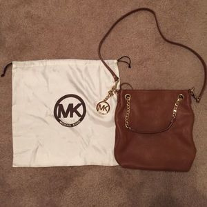 Michael Kors cross body purse.