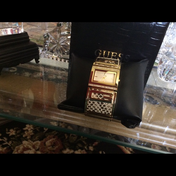 Guess woman's watch. neutral colors. Brand new