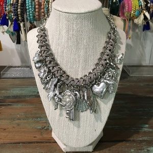 Chain, Suede, and Chunky Charm statement necklace