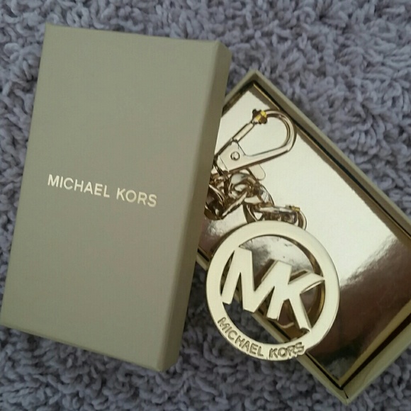 Michael Kors Handbags - AUTHENTIC Gold Michael Kors Key Chain