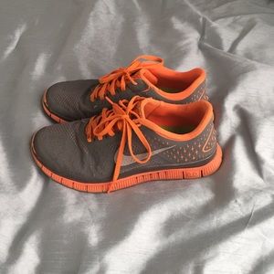Orange and Grey Nike Free running shoes