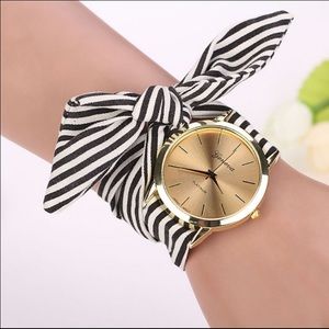 Innovative ribbon style gold watch....
