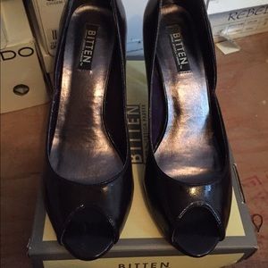 Cute plum or purple peep toe shoe 2" heels.