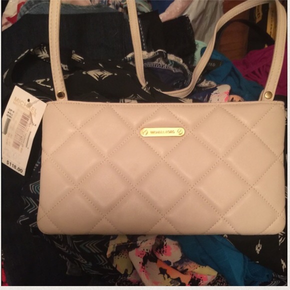 Michael Kors Handbags - MICHAEL KORS QUILTED CLUTCH/PURSE NWT.