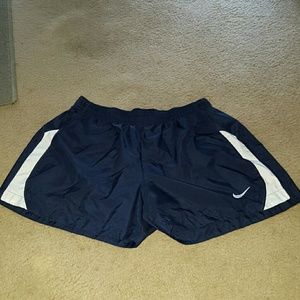 Nike navy and white running shorts