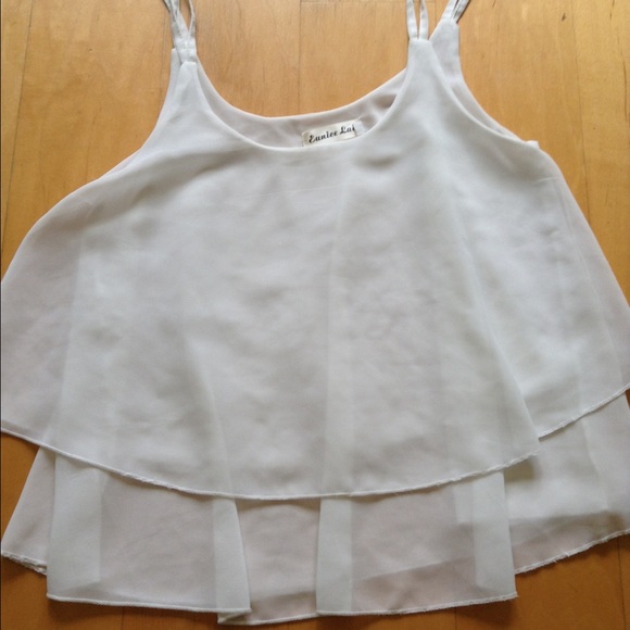 White ruffle shirt