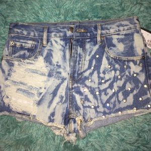 High wasted distressed studded shorts