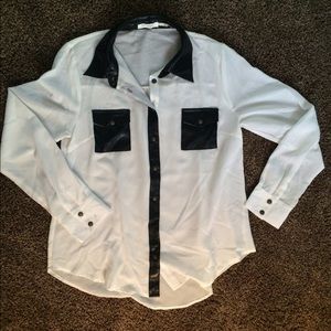White blouse with faux leather accents