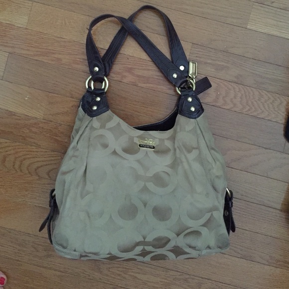 Gold Coach purse with brown leather accents