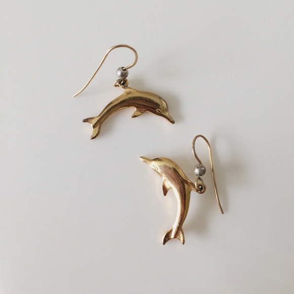Jewelry - Gold metal dolphin earrings 🐬