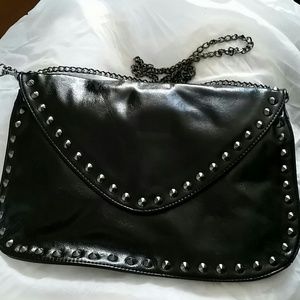 Steve madden black clutch.