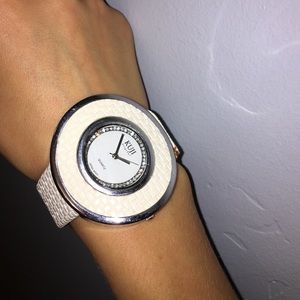 Kuji Quartz watch with white detailing.