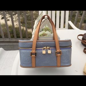 Authentic Vuitton blue bag like new 4x5x9 in