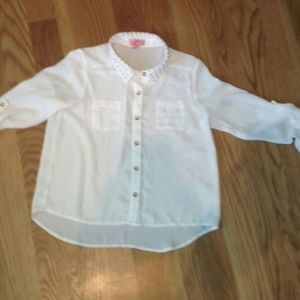 White blouse with gold details