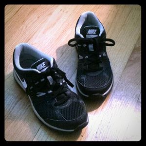 Black Nike athletic shoes