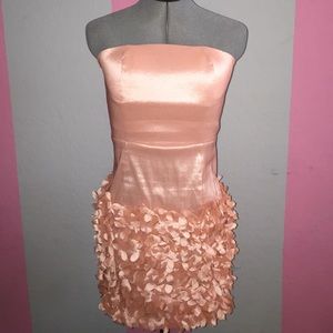 Strapless mini peach dress with petal bottom