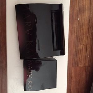 Mirrored, magnetic compacts by Mary Kay