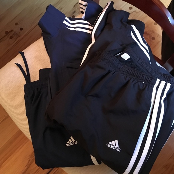 Two adidas sweat suits.
